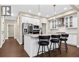 66 Belmont Manor SW, Calgary — photo 4