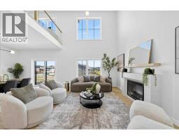 Family room - 7 Lakewood Point, Strathmore, AB T1P0G7 Photo 11