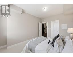 211 - 128 Garden Drive, Oakville, ON L6K0H7 Photo 19