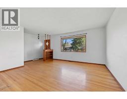 Living room - 101 Langton Drive Sw, Calgary, AB T3E5G1 Photo 6