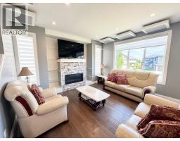 Living room - 116 Kinniburgh Boulevard, Chestermere, AB T1X0M1 Photo 6