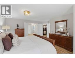 Bedroom - 211 Douglasview Road Se, Calgary, AB T2Z2S1 Photo 17