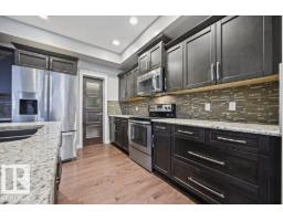 Laundry room - 7627 181 Av Nw, Edmonton, AB T5Z0L9 Photo 7