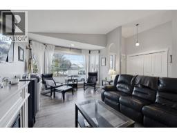 Family room - 85 West Mcdougal Road, Cochrane, AB T4C1P9 Photo 9