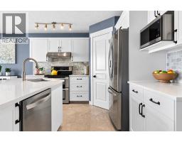 Storage - 38 Somerside Crescent Sw, Calgary, AB T2Y4G8 Photo 12
