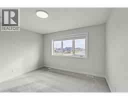 303 Dawson Dock Way, Chestermere, AB T1X2W4 Photo 25