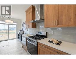 303 Dawson Dock Way, Chestermere, AB T1X2W4 Photo 10