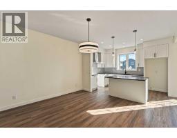 Family room - 129 Bridgeport Gate, Chestermere, AB T1X3E2 Photo 11