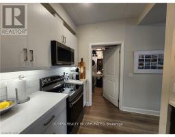Living room - A403 - 5629 Swayze Drive, Niagara Falls, ON L2J0G6 Photo 6