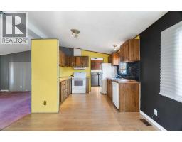 Living room - 320 Railway Avenue Nw, Langdon, AB T0J1X2 Photo 7