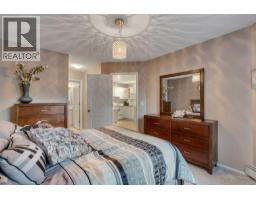 Primary Bedroom - 215, 10 Sierra Morena Mews Sw, Calgary, AB T3H3K5 Photo 6