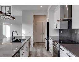 Laundry room - 64 Waterford Terrace, Chestermere, AB T1X2P7 Photo 11