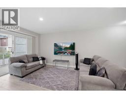 Living room - 427 Redstone View Ne, Calgary, AB T3N1B5 Photo 15