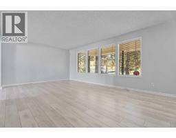 Primary Bedroom - 135 Queensland Road Se, Calgary, AB T2J3R9 Photo 10