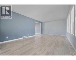 Bedroom - 135 Queensland Road Se, Calgary, AB T2J3R9 Photo 7