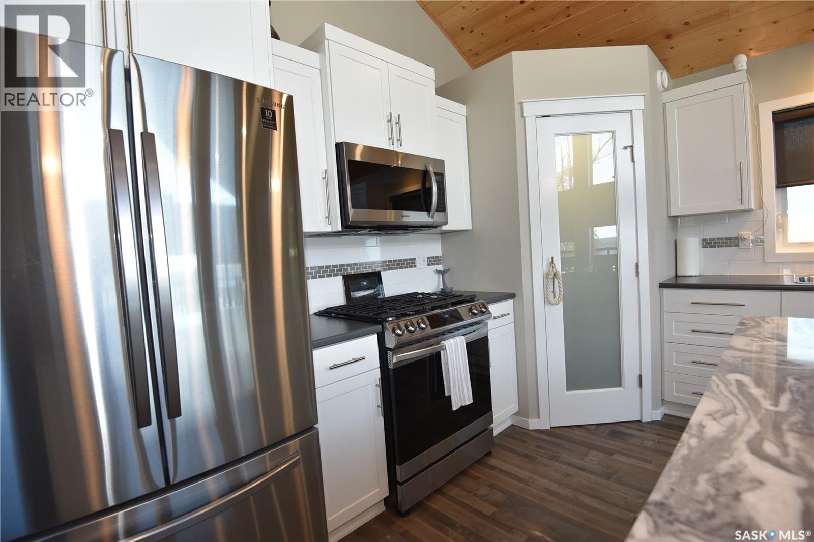 1124 Birch AVENUE, Tobin Lake — photo 11