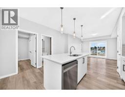 325, 360 Harvest Hills Way NE - photo 1