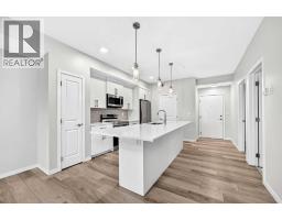 325, 360 Harvest Hills Way NE - photo 3