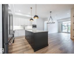 Laundry room - #104 7459 May Common Nw, Edmonton, AB T6R0X6 Photo 6