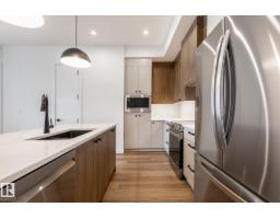 Laundry room - #418 7459 May Common Nw, Edmonton, AB T6R0X6 Photo 6