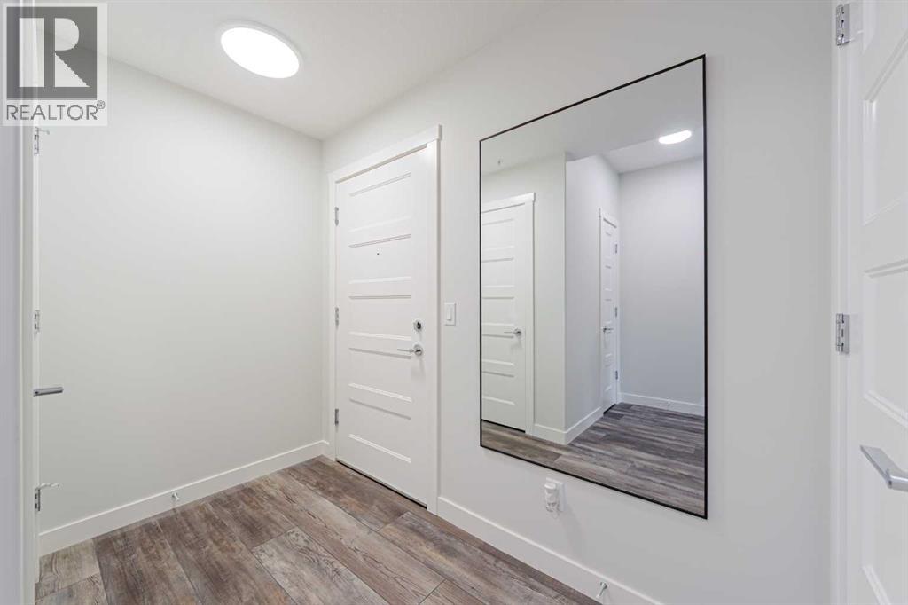 305, 125 Wolf Hollow Crescent SE - photo 6