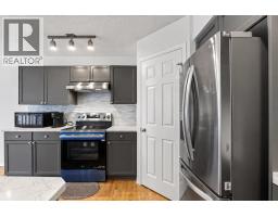 Family room - 22 Evansbrooke Way Nw, Calgary, AB T3P1C5 Photo 12
