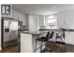Family room - 406 Boykowich Street, Saskatoon, SK S7W0S4 Photo 11