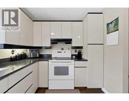 Family room - 256 Parkwood Close Se, Calgary, AB T2J3V9 Photo 10