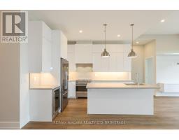Laundry room - 505 - 77 Yates Street, St  Catharines, ON L2R5R7 Photo 10