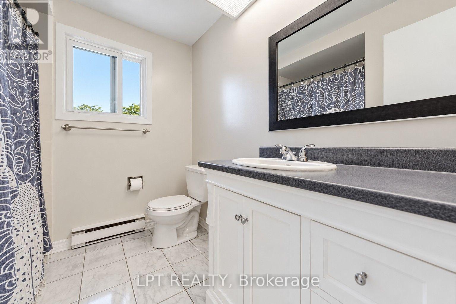 6722 Jeanne D'Arc Boulevard North — photo 18