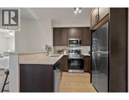 Living room - 1410, 115 Prestwick Villas Se, Calgary, AB T2Z0M8 Photo 6