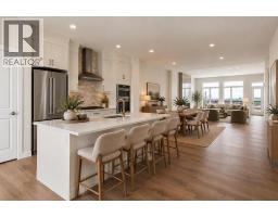 Laundry room - 706 Sovereign Common Sw, Calgary, AB T3C3Y3 Photo 12