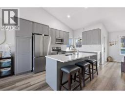 Kitchen - 57 Falcon Crescent, Sylvan Lake, AB T4S2H3 Photo 7