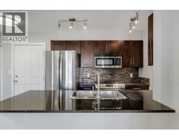 Kitchen - 2402, 403 Mackenzie Way Sw, Airdrie, AB T4B3V7 Photo 6