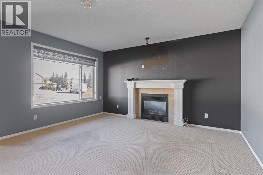 23 Saddlecrest Way NE photo 2