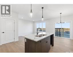 Laundry room - 141 Emma Crescent, Martensville, SK S7V2T1 Photo 11