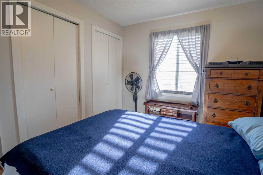 8412, 304 Mackenzie Way SW, Airdrie — photo 23