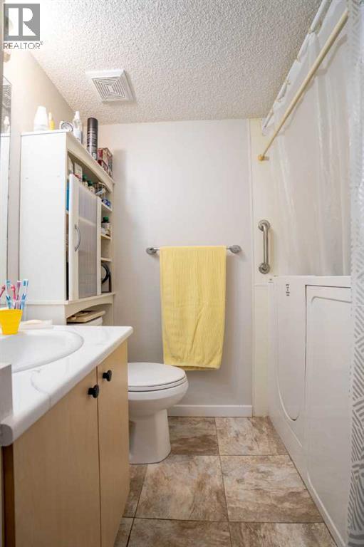 8412, 304 Mackenzie Way SW, Airdrie — photo 22