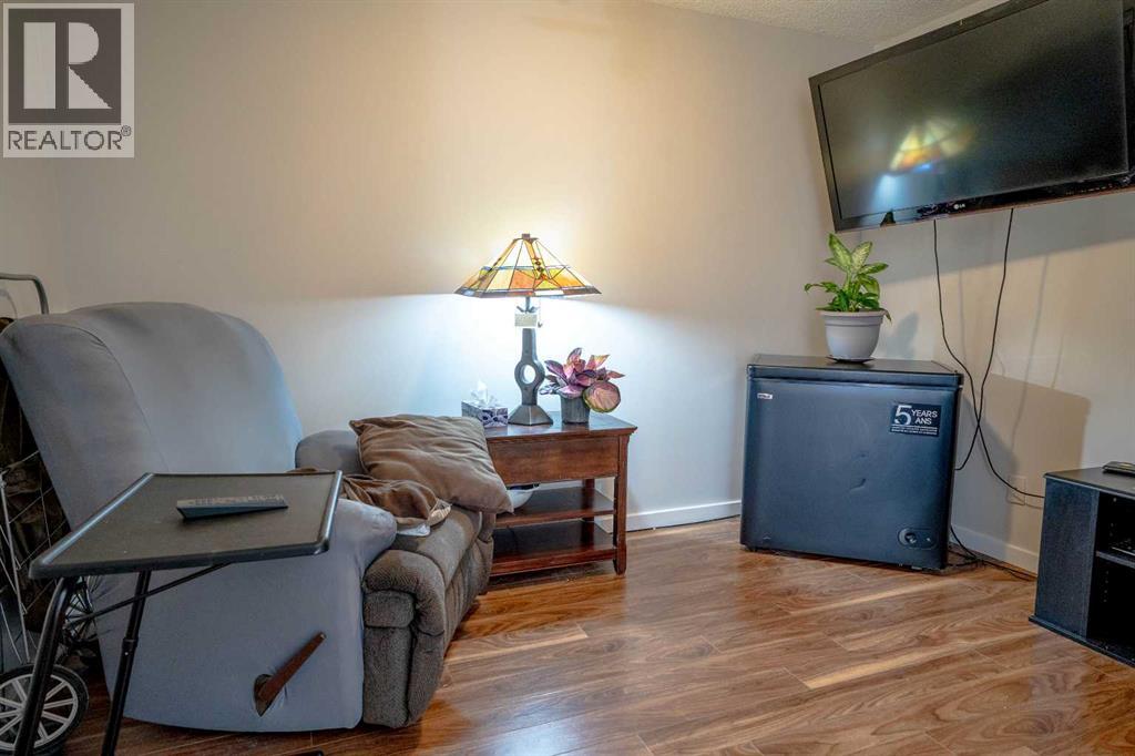 8412, 304 Mackenzie Way SW, Airdrie — photo 25