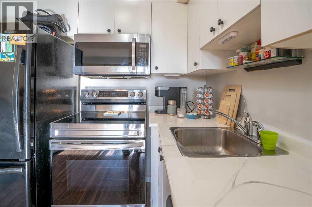 8412, 304 Mackenzie Way SW, Airdrie — photo 14