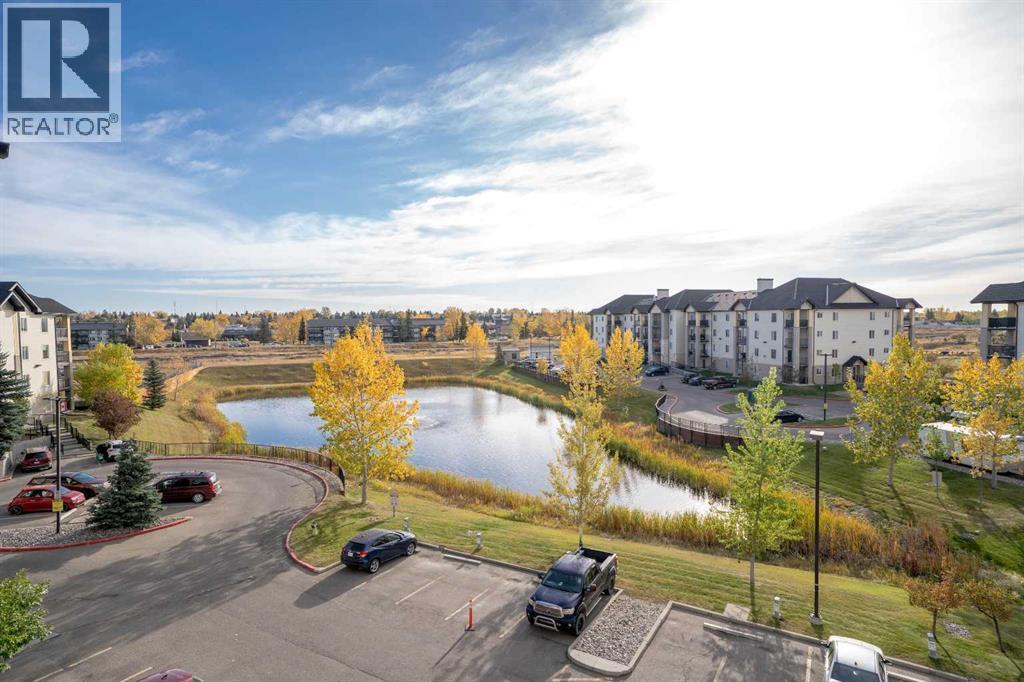 8412, 304 Mackenzie Way SW, Airdrie — photo 9