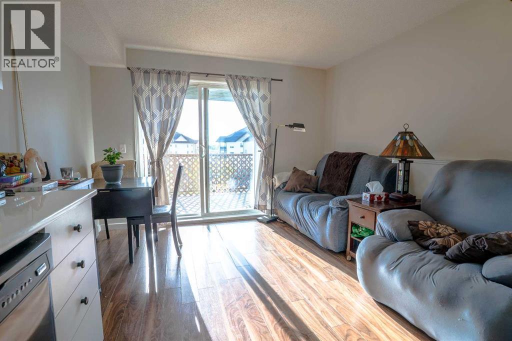 8412, 304 Mackenzie Way SW, Airdrie — photo 20