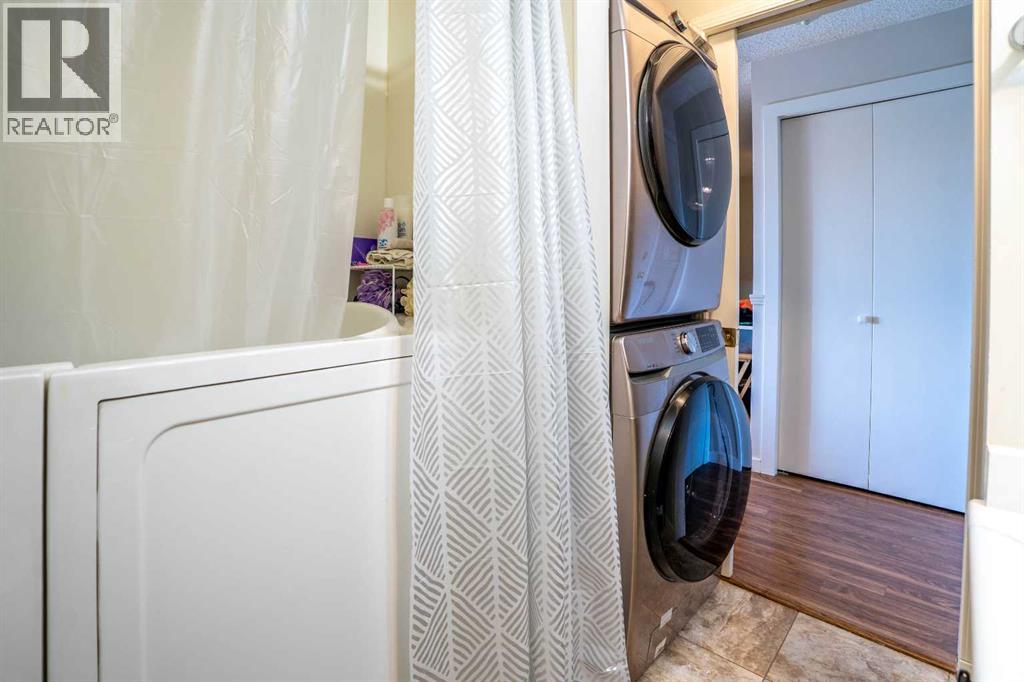 8412, 304 Mackenzie Way SW, Airdrie — photo 32