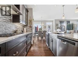 Family room - 19 Mount Rae Heights, Okotoks, AB T1S0M6 Photo 14