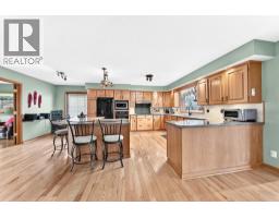 Kitchen - 34 Tucker Road Se, Airdrie, AB T4A1S8 Photo 8