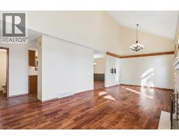 Primary Bedroom - 106 Hawkland Place Nw, Calgary, AB T3G3R8 Photo 6