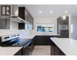 2pc Bathroom - 1042 Carrington Boulevard Nw, Calgary, AB T3P1L8 Photo 11