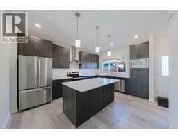 Laundry room - 1042 Carrington Boulevard Nw, Calgary, AB T3P1L8 Photo 8