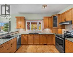 Family room - 196 River Rock Crescent Se, Calgary, AB T2C4J1 Photo 11