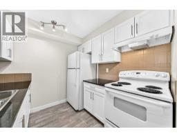 Kitchen - 4118, 403 Mackenzie Way Sw, Airdrie, AB T4B3V7 Photo 8